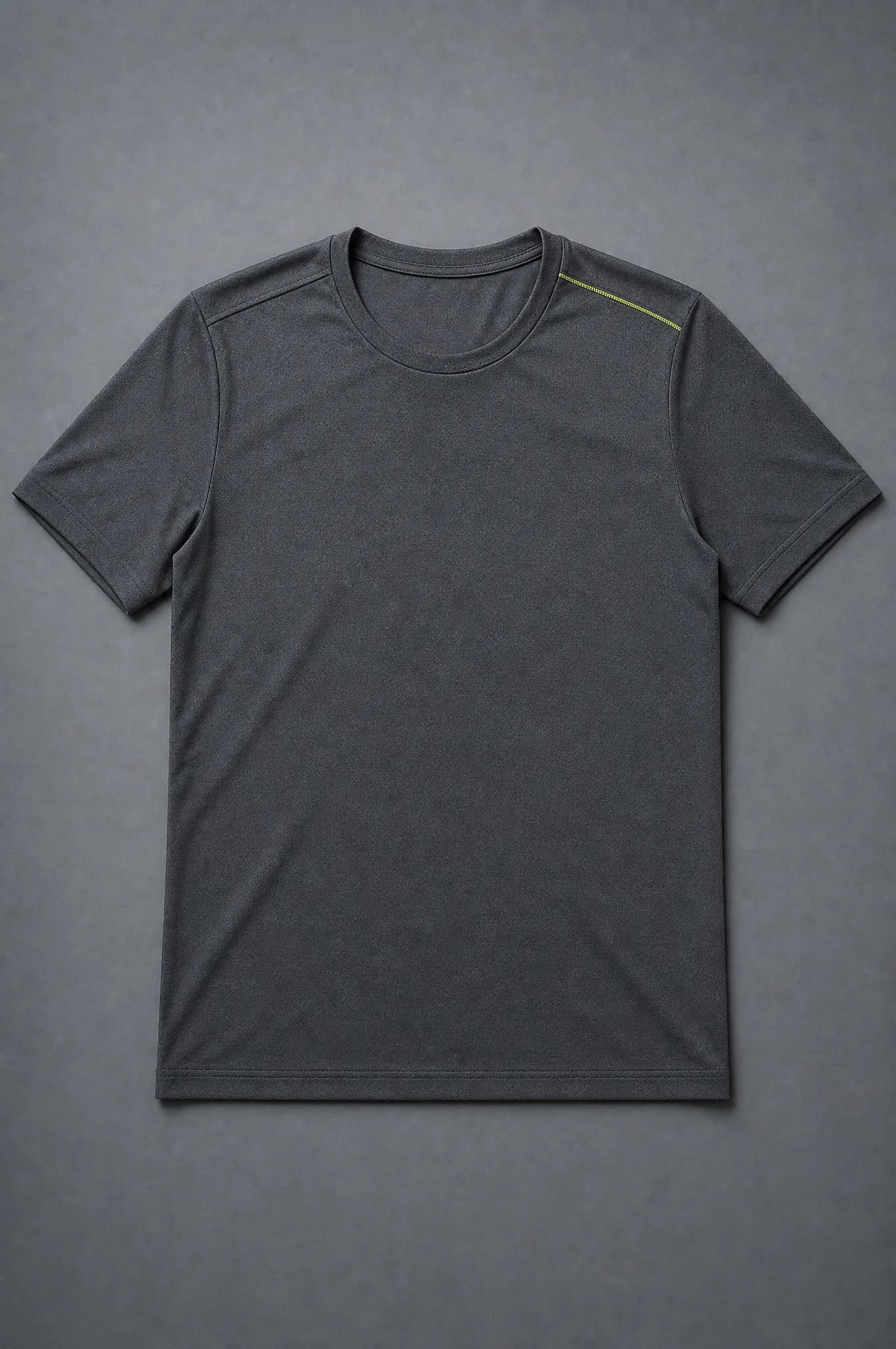 A charcoal short-sleeve crew-neck t-shirt photographed flat from above, empty and unworn, showing a high armhole and a plain straight hem.